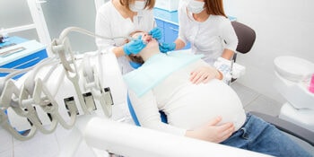 Pregnant woman in dentist's office