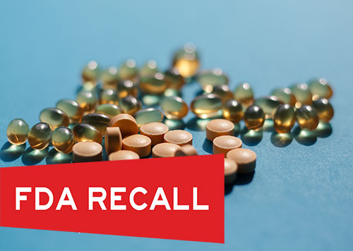 A pile of pills with text reading: FDA Recall