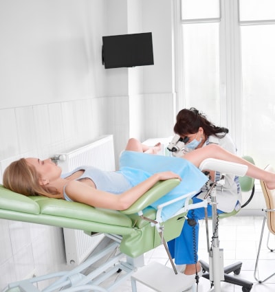 Woman receiving gynecology exam