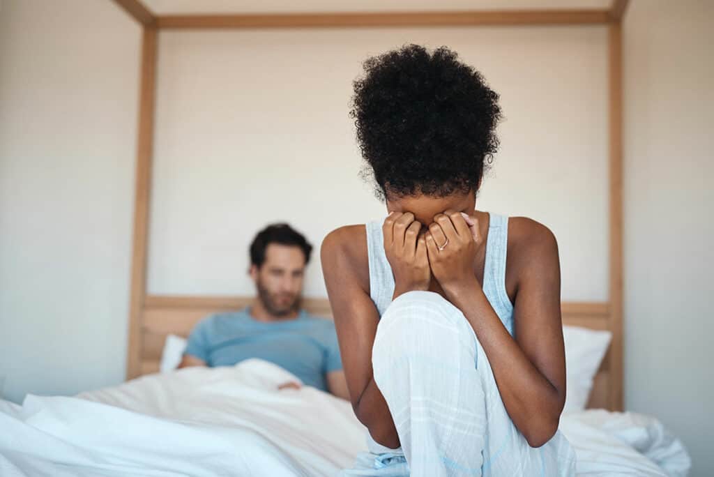 Husband and wife dealing with painful sex