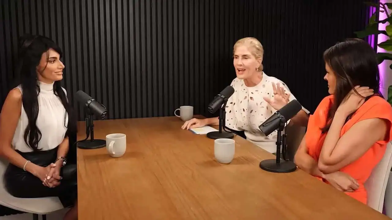 Dr. Thais Aliabadi MD speaking during a podcast interview with two women about health.
