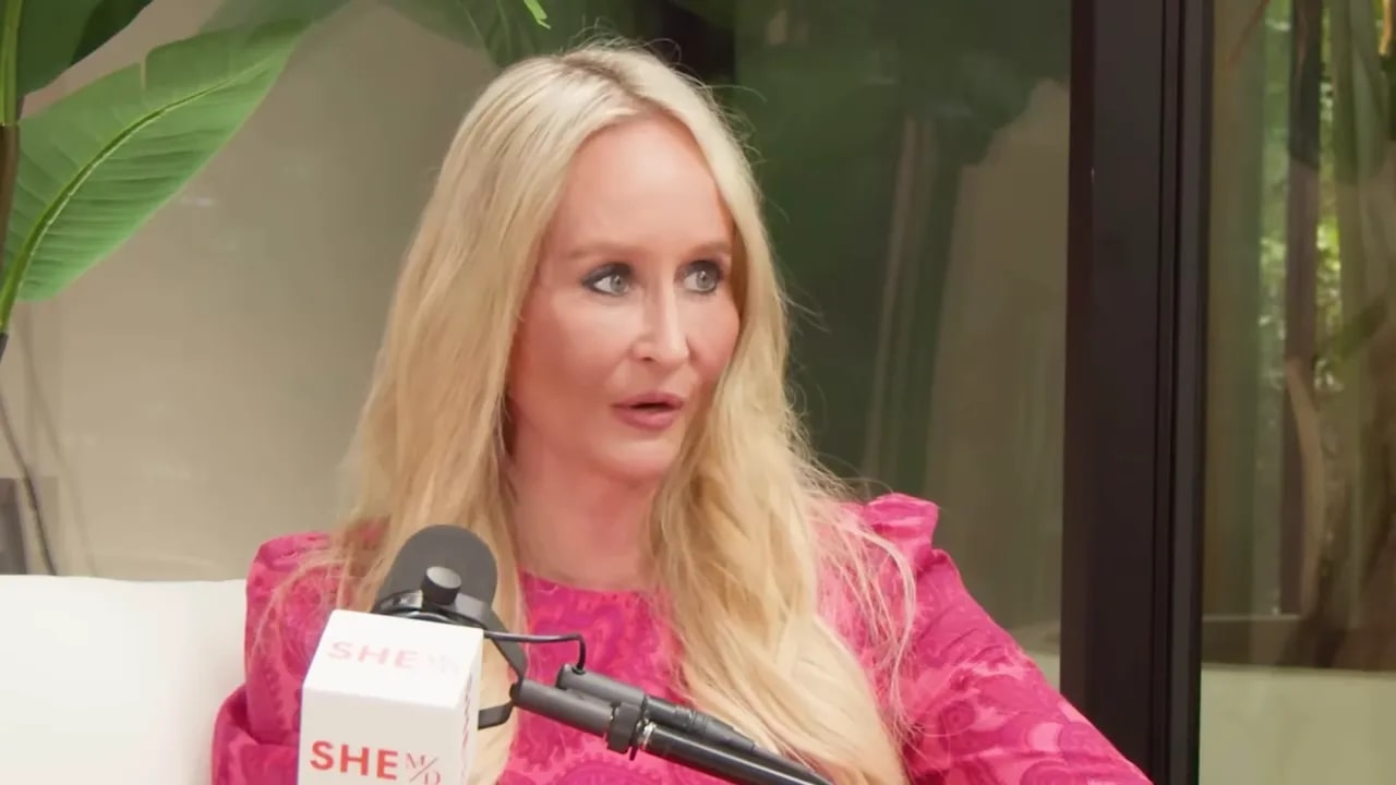 Podcast guest looking to the side and speaking with an animated expression.