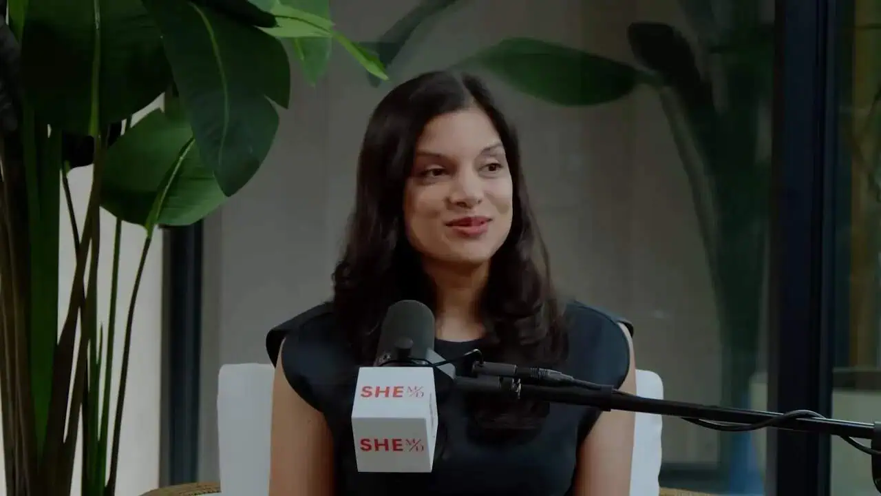 Dr. Thais Aliabadi speaking at a medical conference or event.