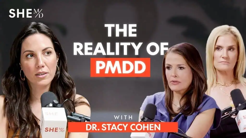 Thais Aliabadi MD discussing women's health and PMDD with colleagues.
