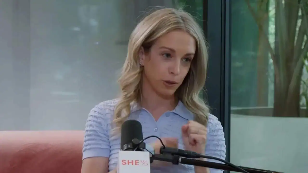 Thais Aliabadi MD speaking at a professional event or interview.