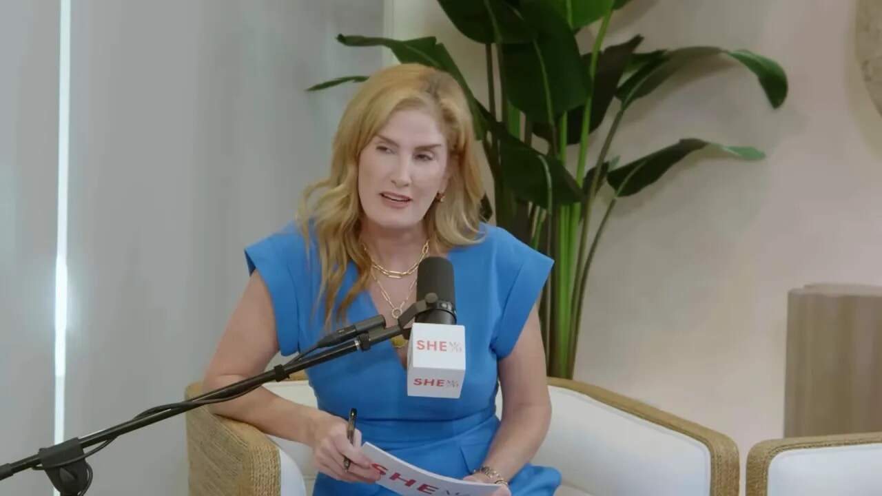 Dr. Thais Aliabadi MD speaking at a medical event, engaging with audience.