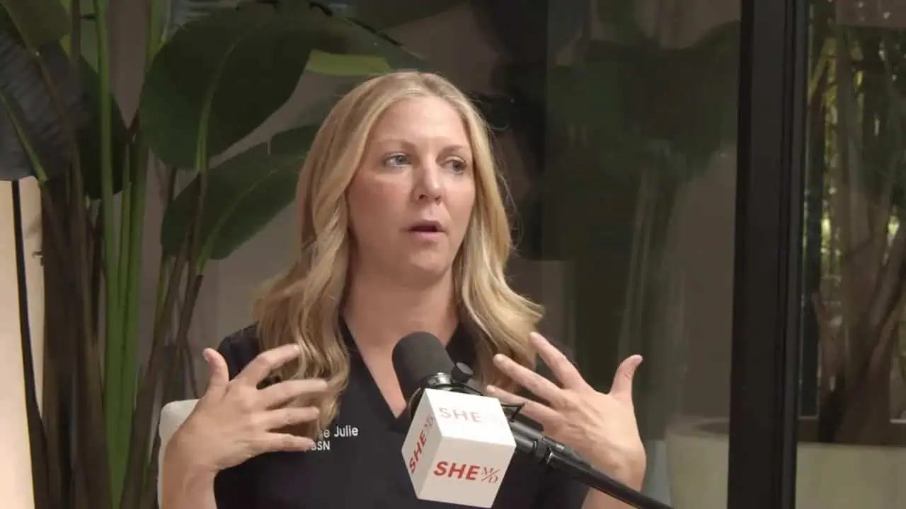 Thais Aliabadi MD, healthcare professional, speaking at an event.