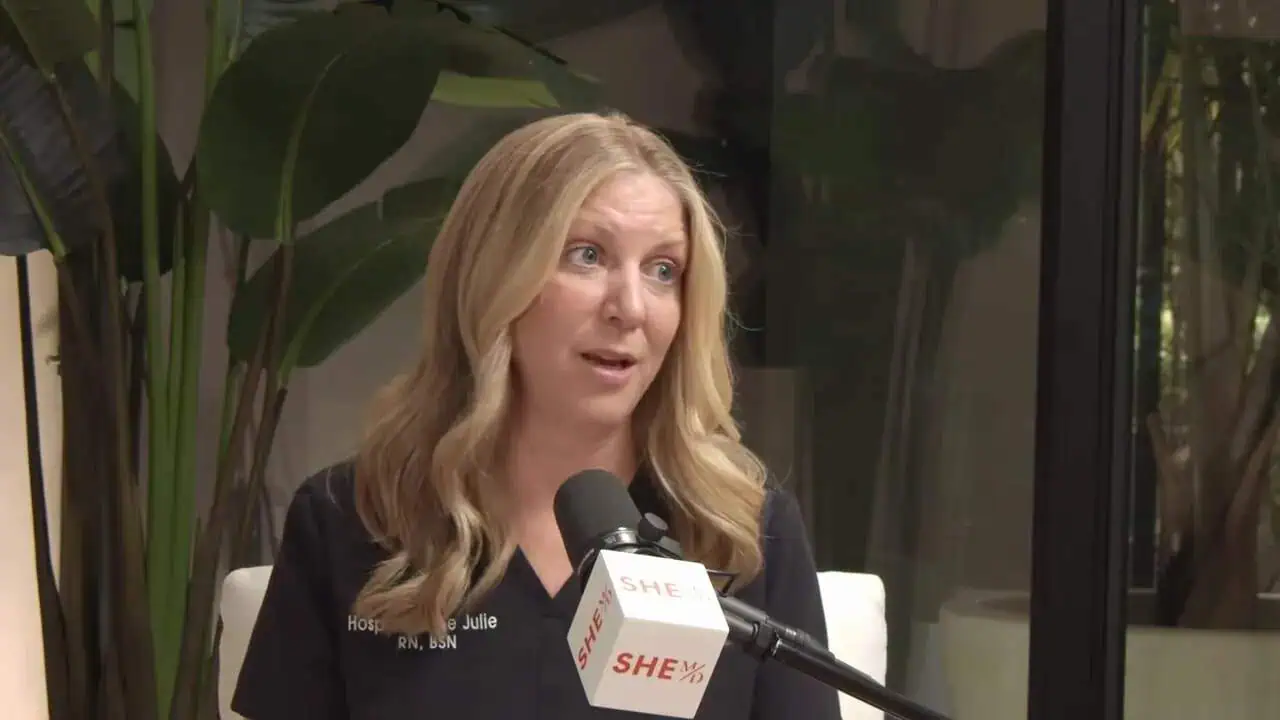 Dr. Thais Aliabadi speaking at a medical event.
