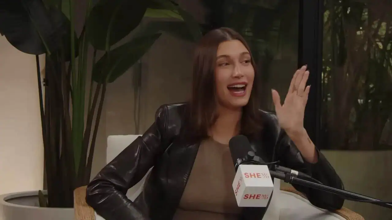 Hailey Bieber speaking about postpartum hemorrhage during an interview