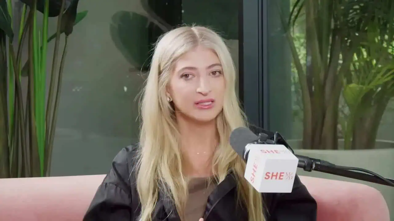 Thais Aliabadi MD speaking at a medical event or interview.
