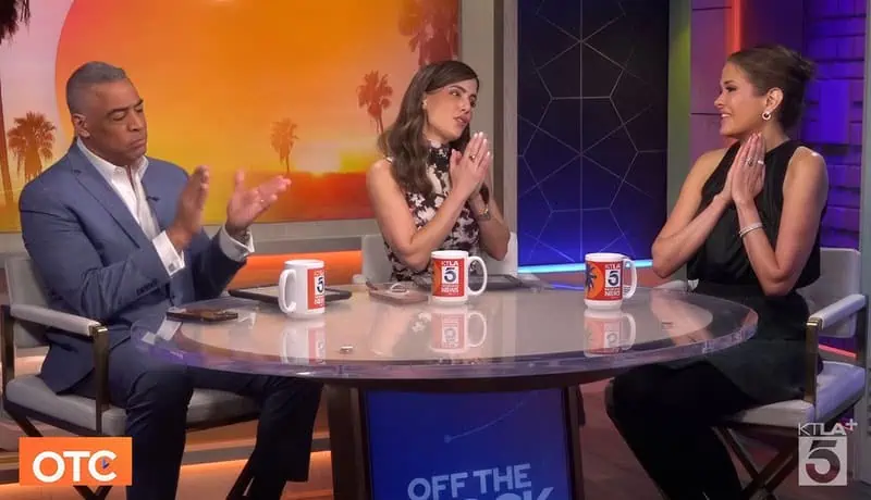 Thais Aliabadi MD speaking on a TV talk show about health and wellness.