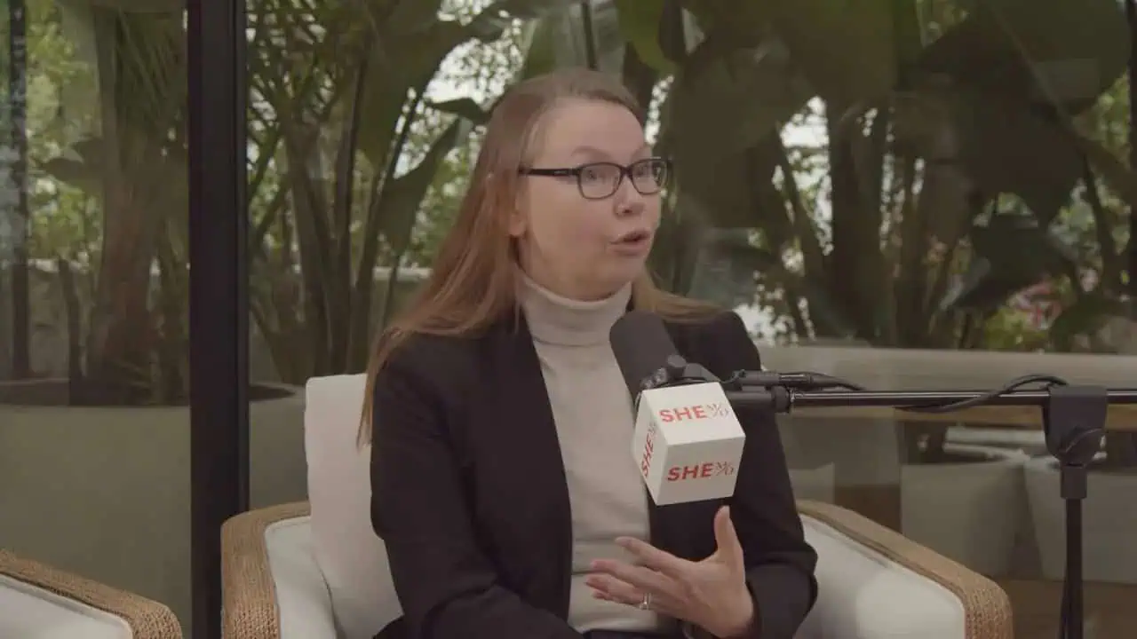Thais Aliabadi MD speaking during an interview in a professional setting.