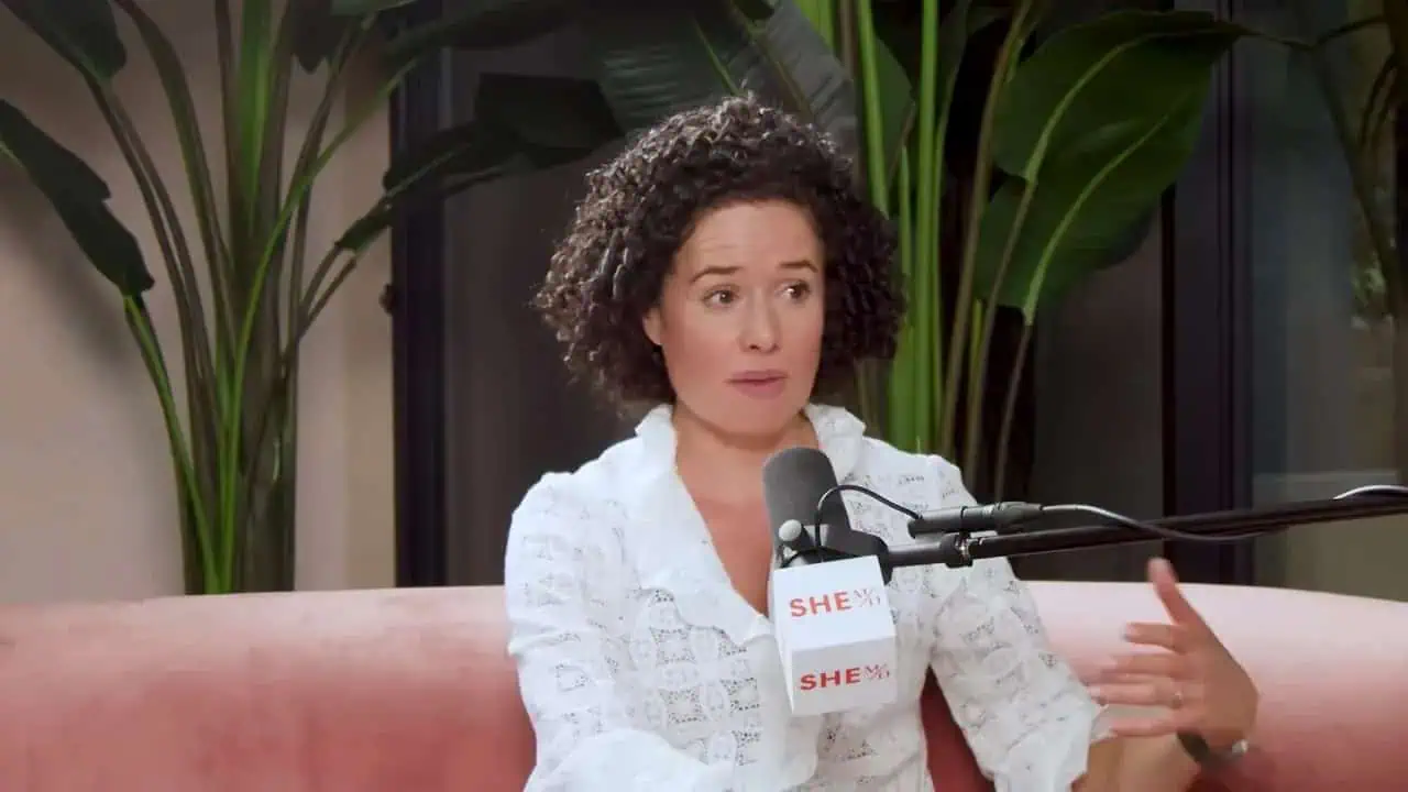 Dr. Thais Aliabadi MD speaking at a podcast about women's health and wellness.
