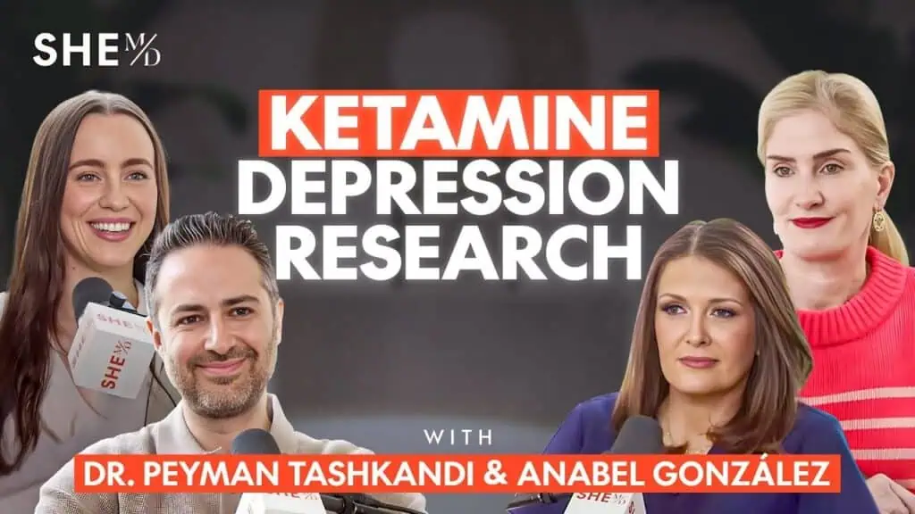 Group of medical professionals discussing ketamine depression research.