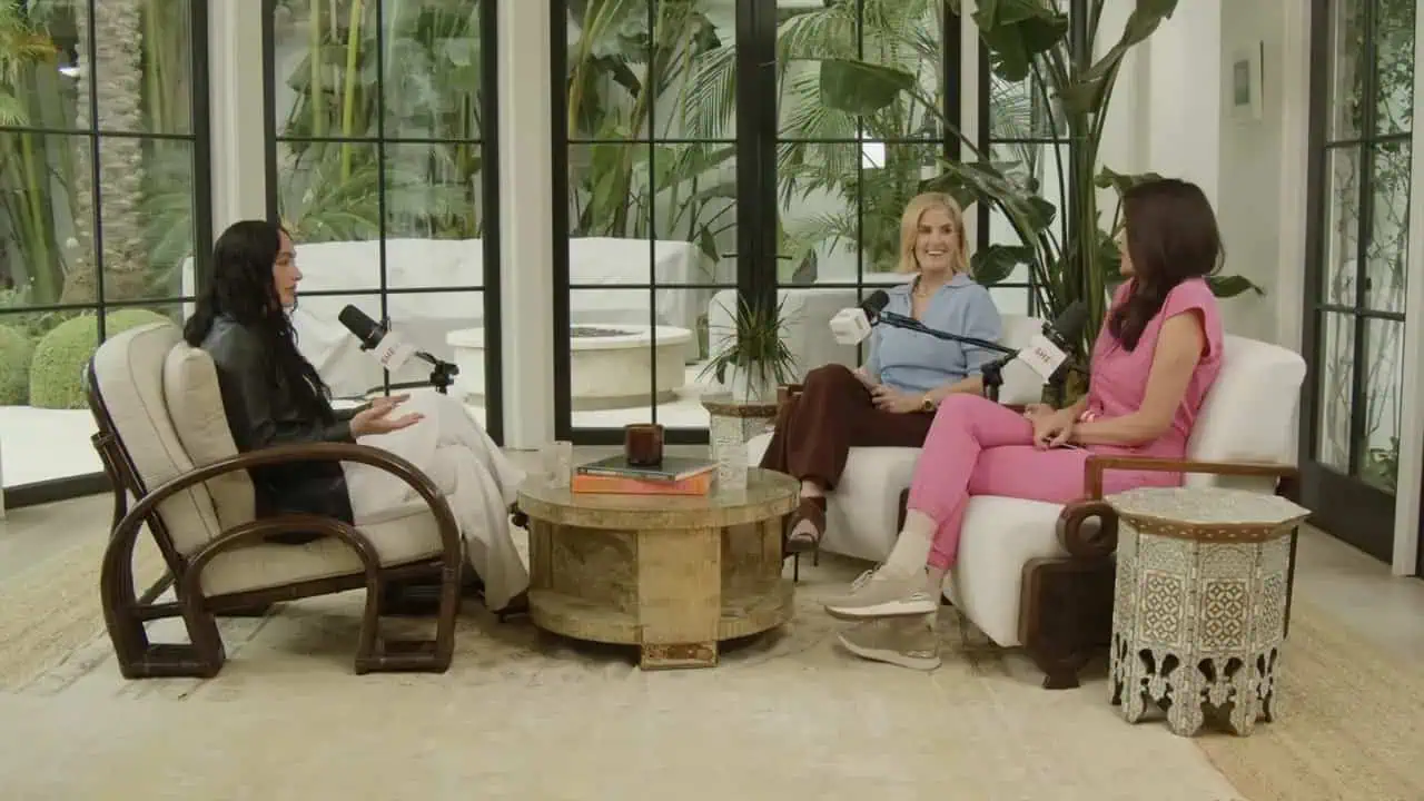 Thais Aliabadi MD during a podcast interview in a bright, modern studio setting.