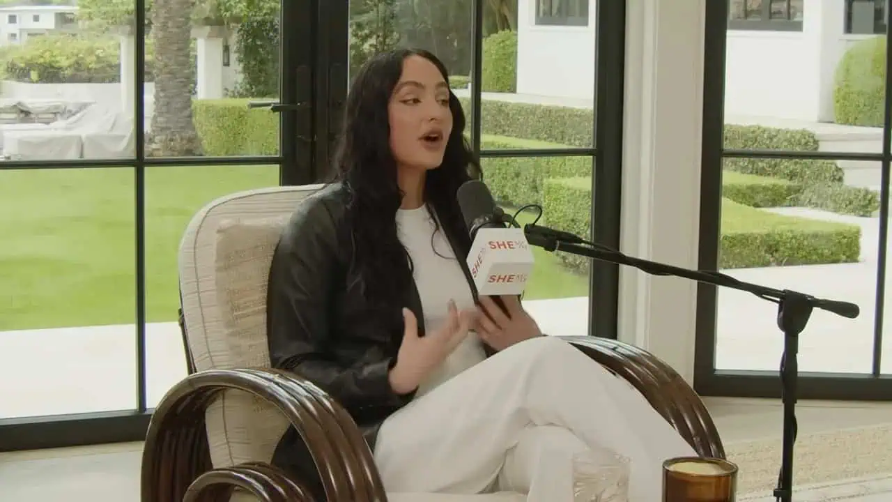 Dr. Thais Aliabadi speaking during an interview in a professional setting.