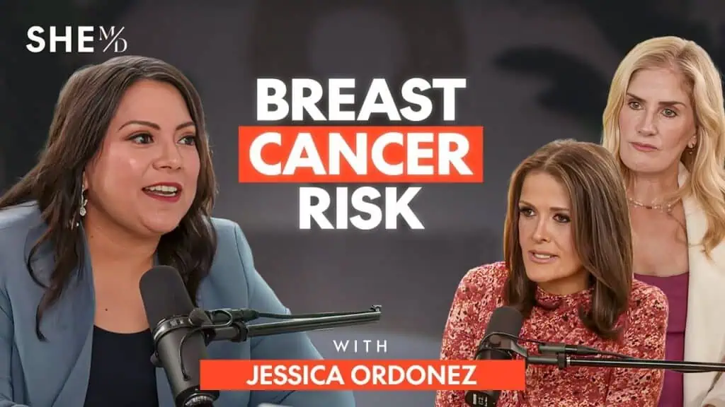 Three women discussing breast cancer risk on a podcast with microphones.