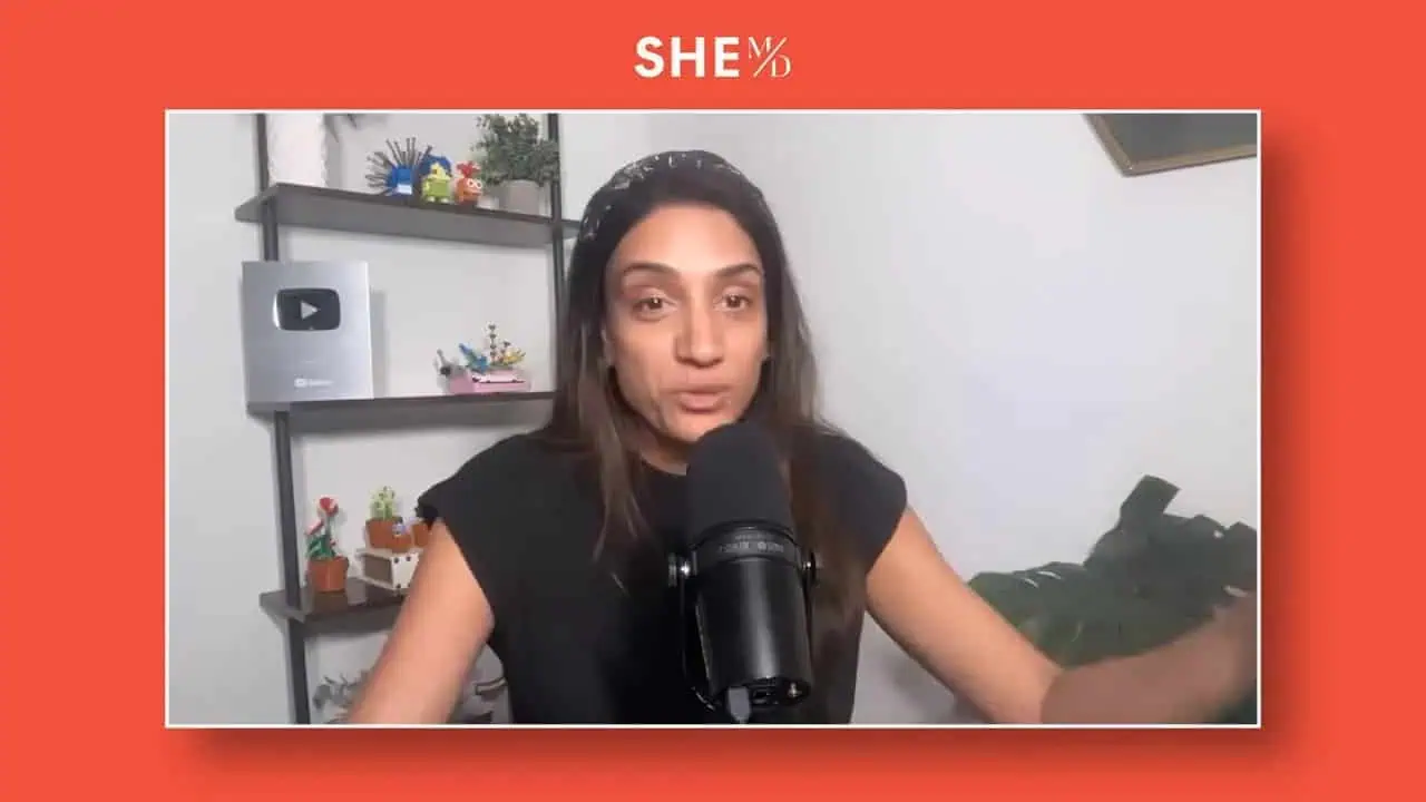 Thais Aliabadi MD speaking into microphone for medical discussion.