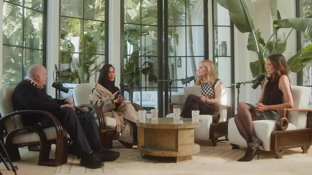 Thais Aliabadi MD participating in a panel discussion with three women in a bright, modern setting.