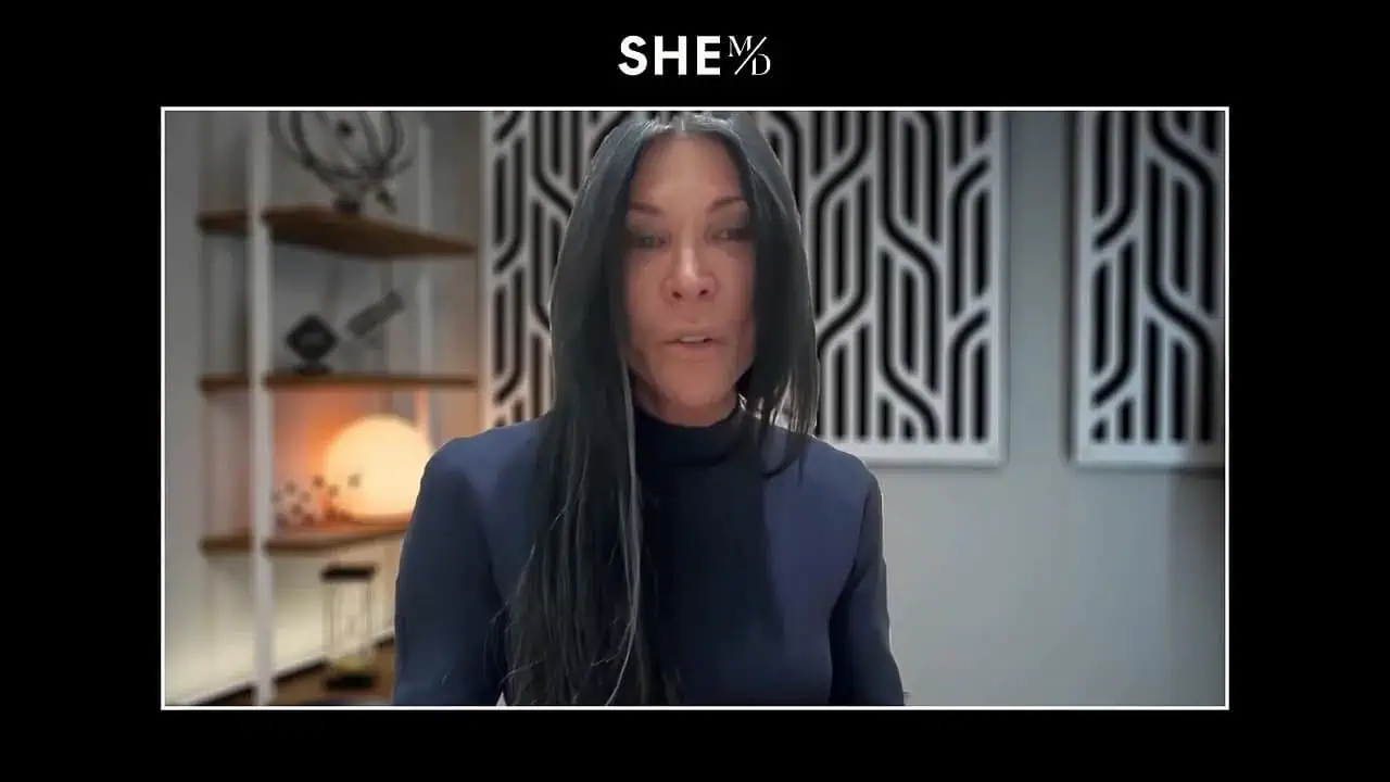 Thais Aliabadi MD in a professional setting, looking at the camera.
