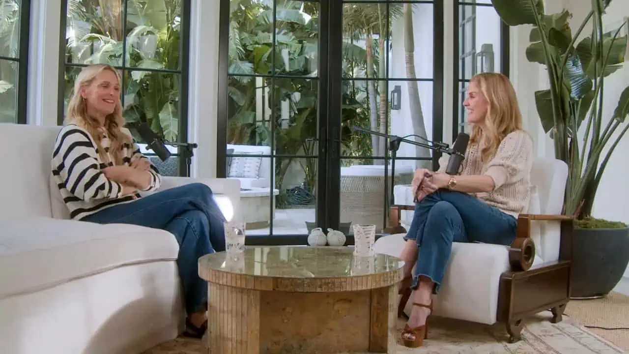 Dr. Thais Aliabadi during a podcast interview in a modern studio setting.