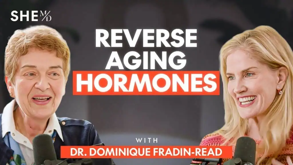 Two women discussing reverse aging hormones with Dr. Dominique Fradin-Read.