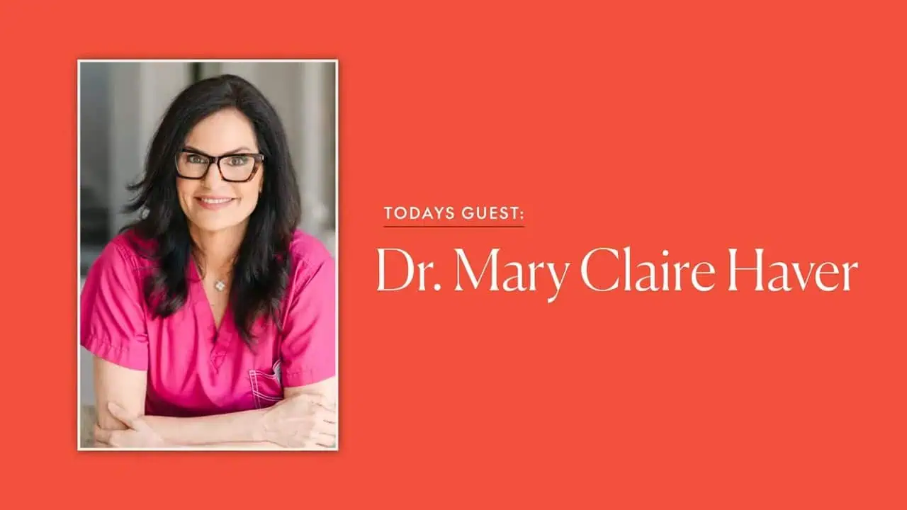 Dr. Mary Claire Haver smiling in pink scrubs for health and wellness.
