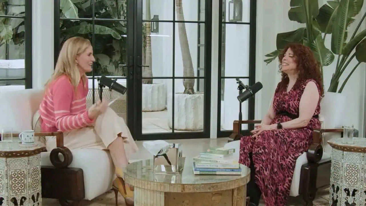 Dr. Thais Aliabadi during an interview in a modern, bright setting.