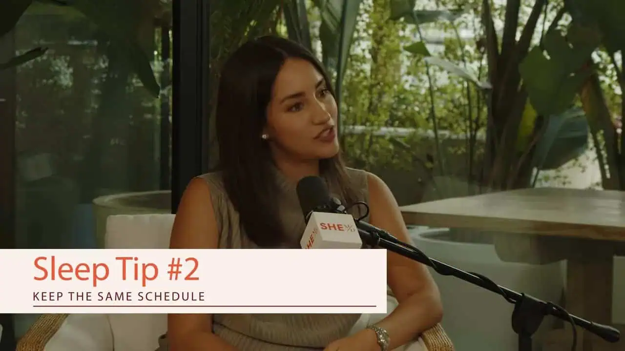 Alexandra Zatarain speaking with a Sleep Tip #2 banner
