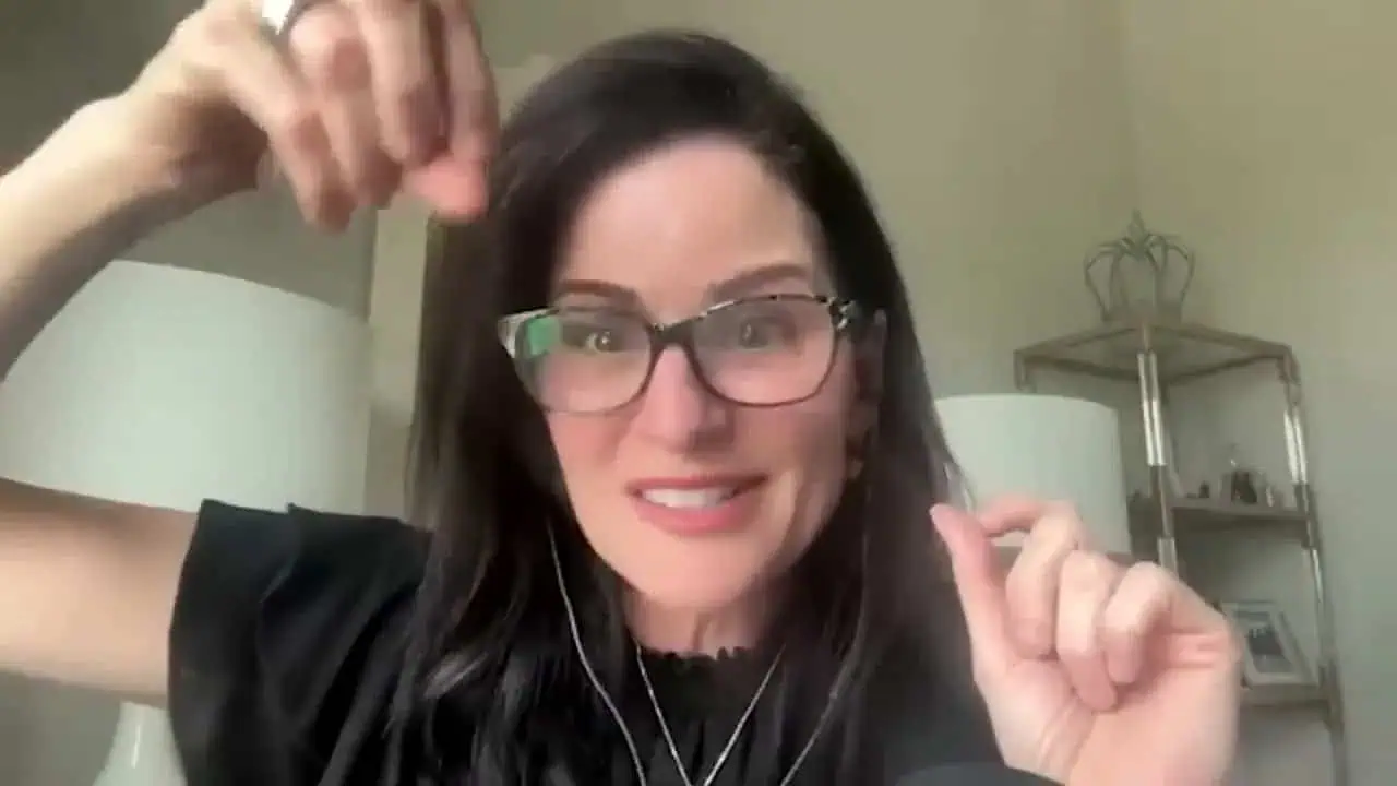 Dr. Haver holding one hand above the other while explaining testosterone levels